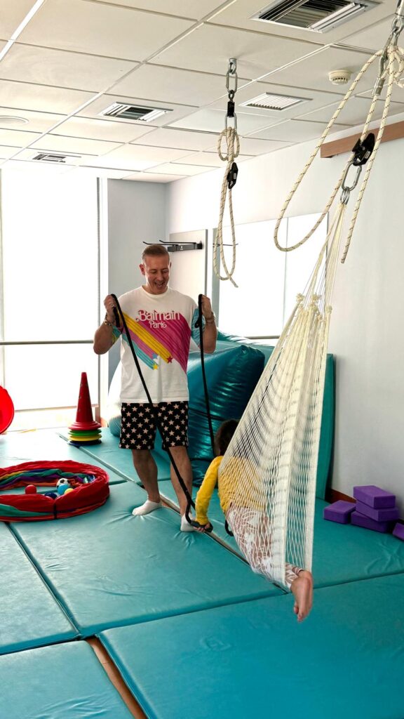 Dimitrios in a sensory integration therapy session